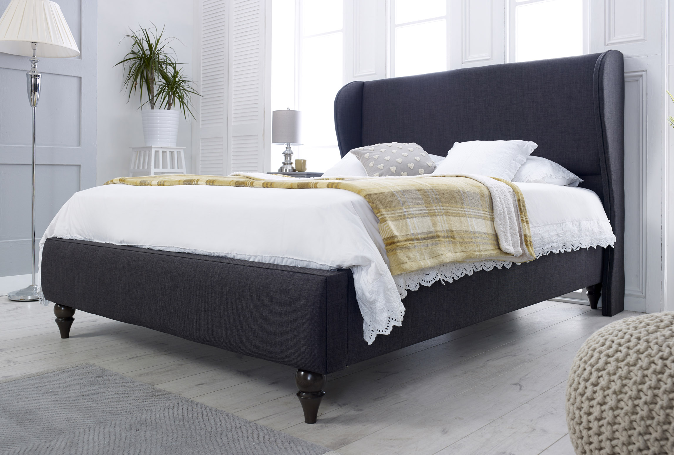 Mario Fabric Upholstered Wing Bed Frame - Double